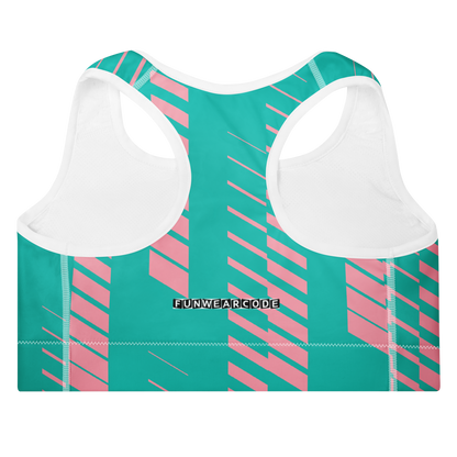 Teal and pink sports bra with white straps on a white background