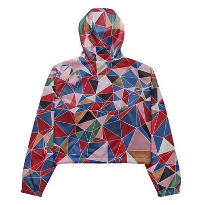 Colorful geometric patterned windbreaker with spring cherry blossom graphic on a white background