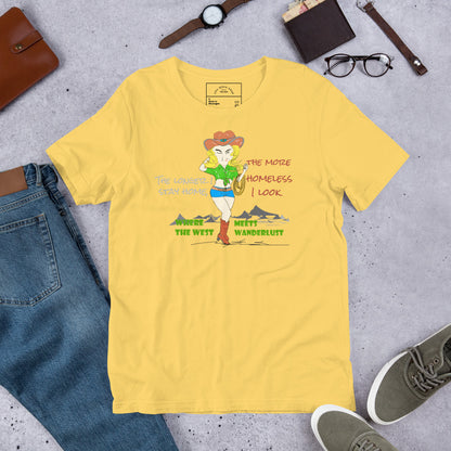 Yellow t-shirt with a playful cowgirl graphic design and text on a gray surface with jeans, shoes, and accessories